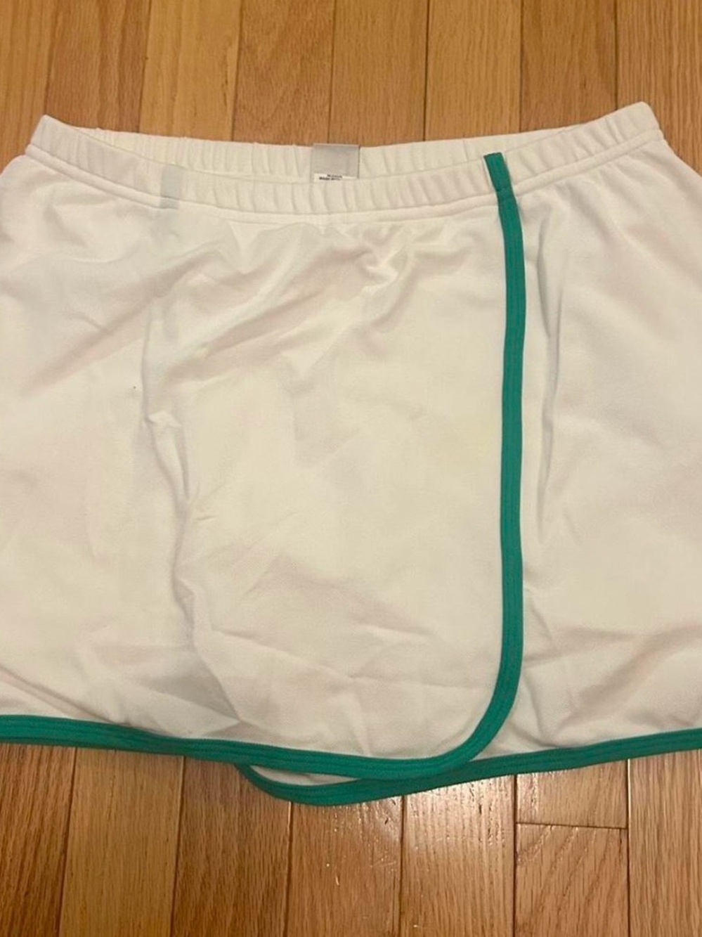 Women’s White Tennis Skirt with Green Trim and Built in Shorts